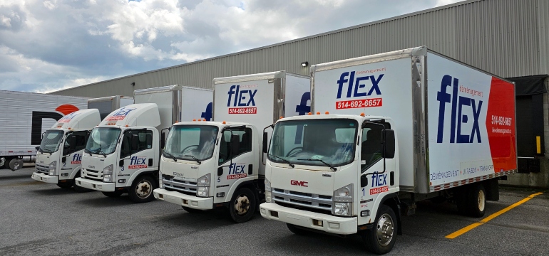 Moving trucks in front of storage in Montreal